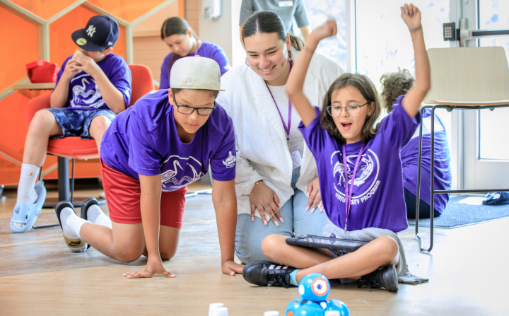 kids playing with robot