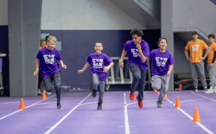 indigenous youth running in a track